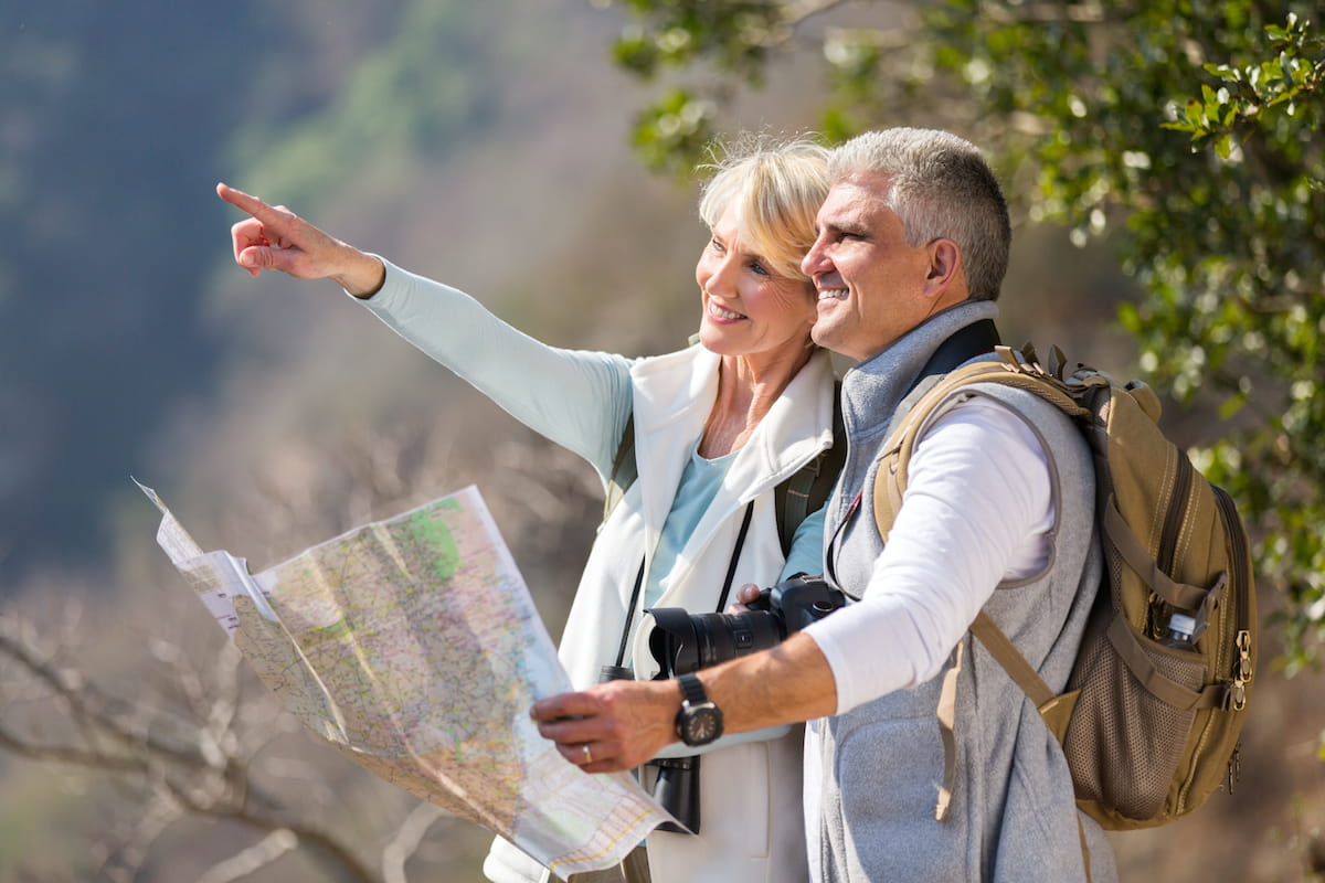 middle aged couple hiking outdoors